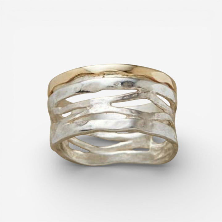 Vintage hollow ring in gold and silver